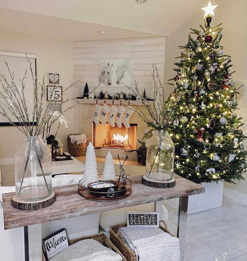 decorated Christmas tree and fireplace with stockings